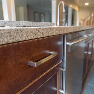 Falsetta - Brown Cabinets with Mosaic Tile Backsplash