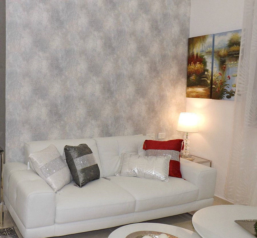 leather couch, amazing wallpaper, warm art