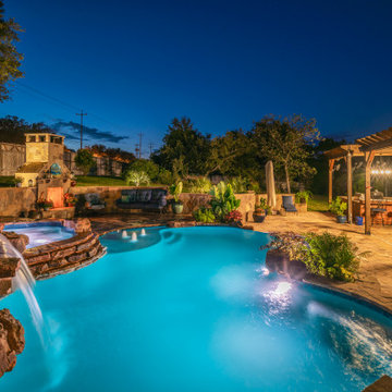 Freeform Pool with Negative Edge, Grotto, and Spa