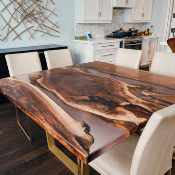 5'*5' Black walnut and clear resin Dining Table paired with gold legs.