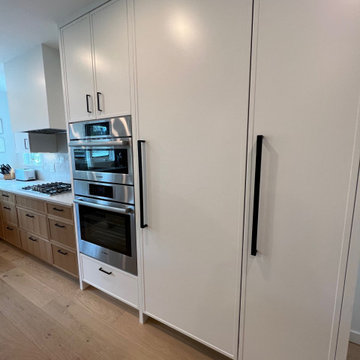White Pantry Wall with Full-Length Black Pull