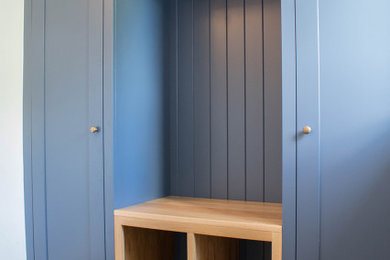 Design ideas for a medium sized traditional cloakroom in Other.