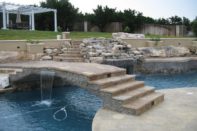 Inspiration for a large traditional backyard full sun garden in San Francisco with a water feature and concrete pavers.