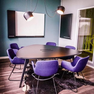 Photo of a modern home office and library in Other.