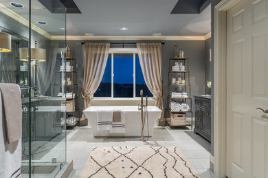 Inspiration for a large transitional master porcelain tile and gray floor bathroom remodel in Seattle with gray cabinets, gray walls, an undermount sink, a hinged shower door and beaded inset cabinets