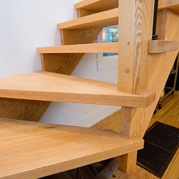 Open Oak Winder Steps with Black Balusters and Wood Newel | East York