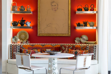 Dining room - eclectic light wood floor dining room idea in Miami with red walls and no fireplace