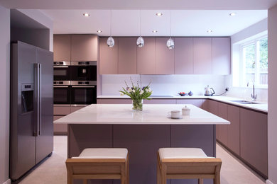 Medium sized contemporary kitchen in Surrey.
