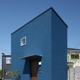 他の地域のモダンスタイルのおしゃれな家の外観 (青い外壁) の写真