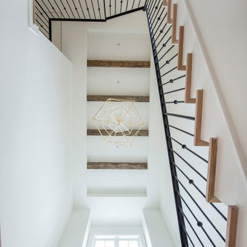 Clean & Modern White Farmhouse on E. 10th St.