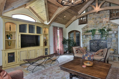 Living room - rustic living room idea in San Francisco with a media wall