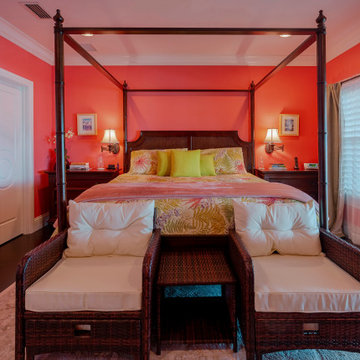 Resort-Inspired Bedroom With Four-Poster Bed And Coral Accents