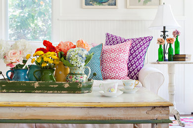 Example of a small cottage chic open concept family room design in Los Angeles with white walls