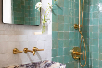 Drop-in bathtub - small modern green tile and ceramic tile single-sink drop-in bathtub idea in Seattle with marble countertops