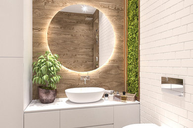 Пример оригинального дизайна: главная ванная комната среднего размера в современном стиле с плоскими фасадами, белыми фасадами, полновстраиваемой ванной, инсталляцией, белой плиткой, керамогранитной плиткой, белыми стенами, полом из керамогранита, настольной раковиной, столешницей из искусственного камня, коричневым полом и белой столешницей
