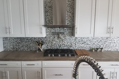 Kitchen - contemporary kitchen idea in Omaha