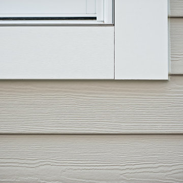 Pearl Gray James Hardie siding - 6'' exp. Cedarmill Finish.