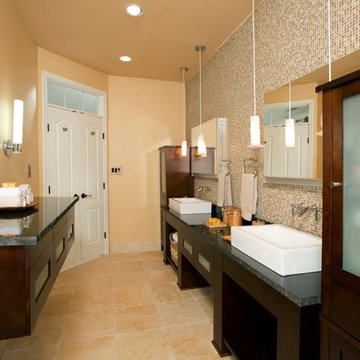 Use of Glass, Light and Fixtures Sets Leesburg Master Bathroom Apart