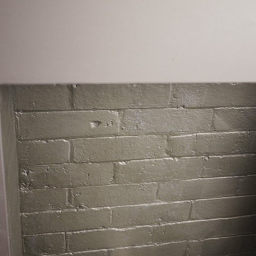Fireplace refaced with Dekton matte black