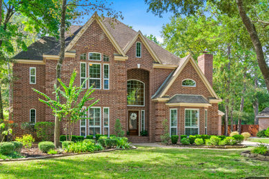 Example of a transitional exterior home design in Houston
