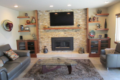 Family room - transitional porcelain tile family room idea in Sacramento with beige walls, a standard fireplace, a stone fireplace and a wall-mounted tv