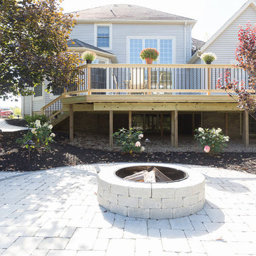 Deck and Unilock Paver Patio with Firepit & Landscaping