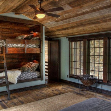 Weathered Antique Flooring and Paneling in a Rustic Cabin Bunk Room