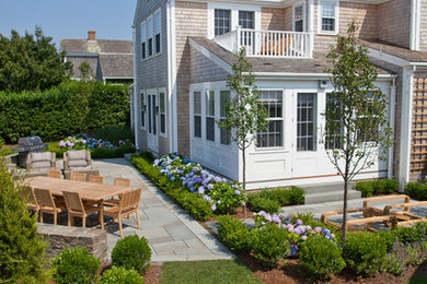 This is an example of a beach style patio in Boston.