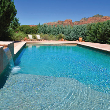 Pool with cover and attached, raised spa