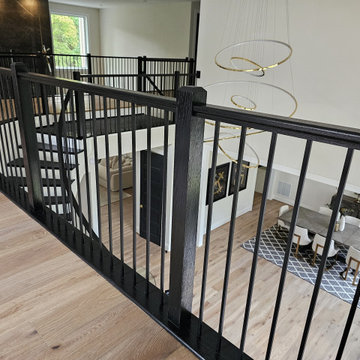 Project #130 | Curved Staircase with Wraparound Balcony