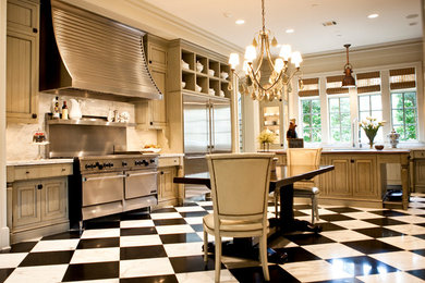 Inspiration for a traditional kitchen in Houston with distressed cabinets and marble benchtops.
