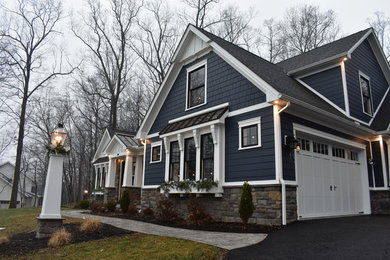 Example of an arts and crafts exterior home design in Other