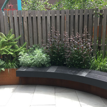 Modern Garden with Curved Corten Border