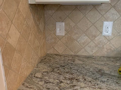 painting travertine backsplash tiles