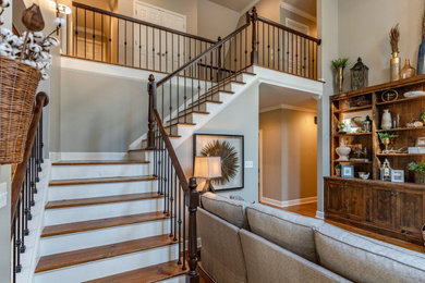 Example of a transitional family room design in Atlanta