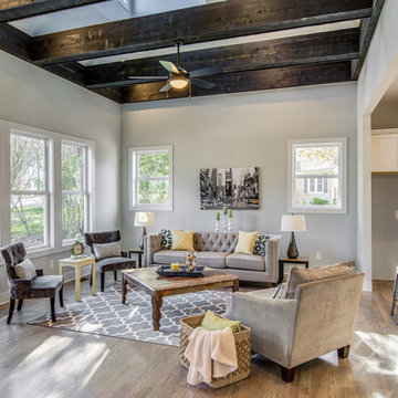 Living Room with Vaulted Ceiling and Exposed Rafters