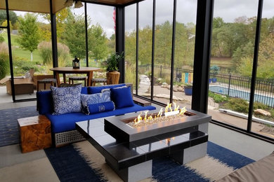 Sunroom - contemporary sunroom idea in Other