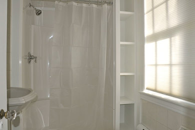 Alcove shower - small eclectic master beige tile and ceramic tile alcove shower idea in Boston with open cabinets, white cabinets and a pedestal sink