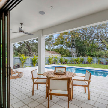Covered Outdoor Dining and Pool View — East of the Trail Sarasota