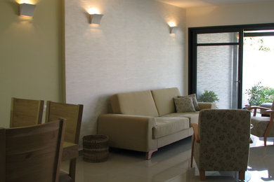 Living room - contemporary living room idea in Other