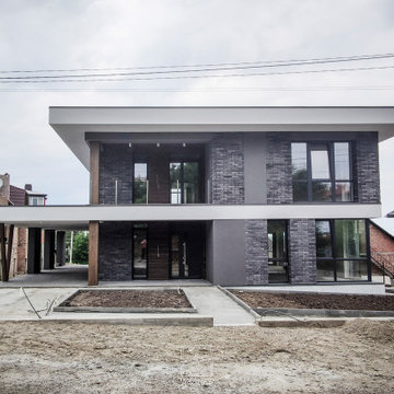 Modern two-story house with a terrace