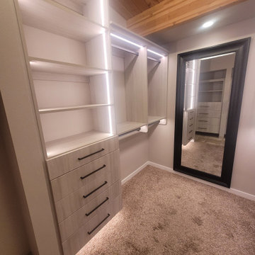 Open concept master closet with lighting