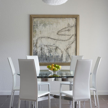 Breakfast room featuring artwork by Julie Zimmer "Jet"