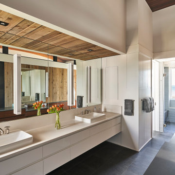 Contemporary Primary Bathroom in a Figure Eight Island Custom Home