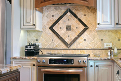 Mid-sized elegant l-shaped light wood floor and beige floor eat-in kitchen photo in Chicago with an undermount sink, raised-panel cabinets, beige cabinets, granite countertops, beige backsplash, ceramic backsplash, stainless steel appliances and an island