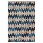Jaipur Living - Nikki Chu by Jaipur Living Zevi Chevron Area Rug, Blue/Beige, 9'6"x12'7" - Inspired by the African motifs, the Sanaa collection by Nikki Chu is the perfect combination of statement-making patterns and easy-to-decorate-with hues. The Zevi rug boasts a perfectly distressed chevron design in tones of blue, beige, blush, gray, and tan. Ivory fringe trim adds texture and vintage allure. This power-loomed rug features a plush and durable blend of polyester and polypropylene, lending the ideal accent to high-traffic spaces.