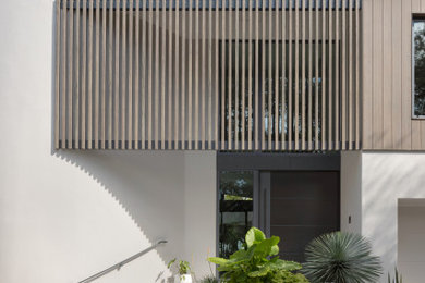 Example of a minimalist home design design in Tampa