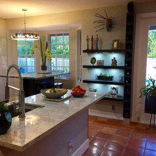 cuisine moderne avec un sol en carreau de terre cuite