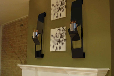 Inspiration for a mid-sized timeless formal and open concept living room remodel in Toronto with green walls, a standard fireplace and a plaster fireplace