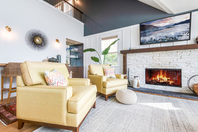 This is an example of a beach style family room in Seattle.